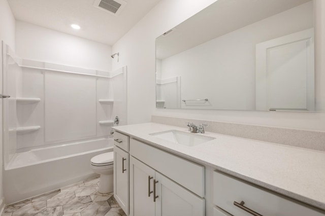bathroom with toilet, vanity, bathtub / shower combination, marble finish floors, and recessed lighting