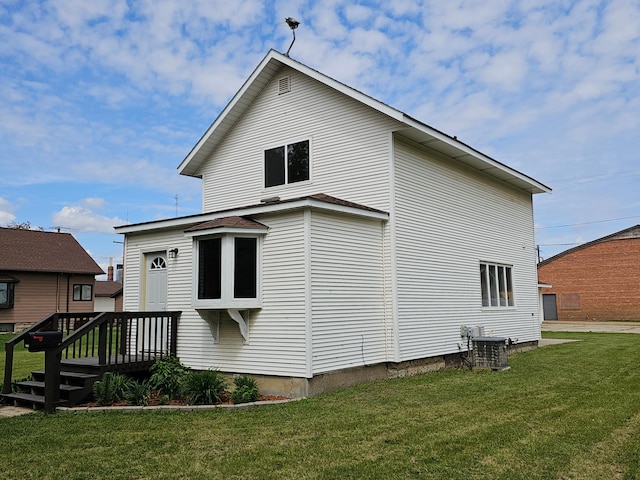 2729 King Ave, Slayton, MN 56172 - rear view of property featuring a yard and central air condition unit