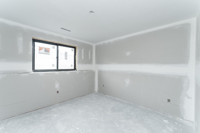 1806 Brandt Dr NE, Byron, MN 55920 - spare room with concrete flooring