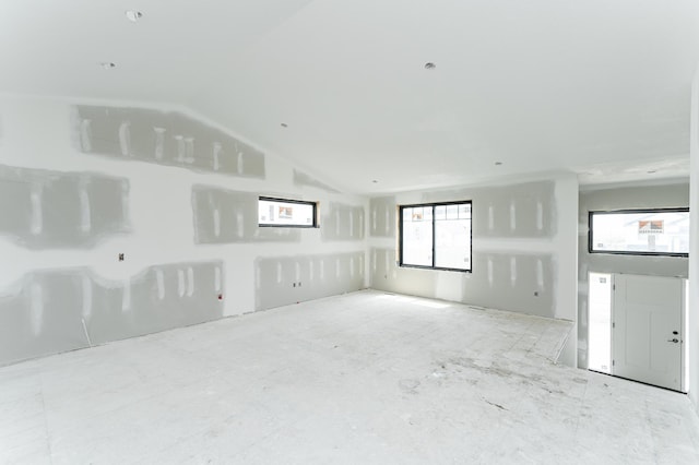 1806 Brandt Dr NE, Byron, MN 55920 - unfurnished room with lofted ceiling