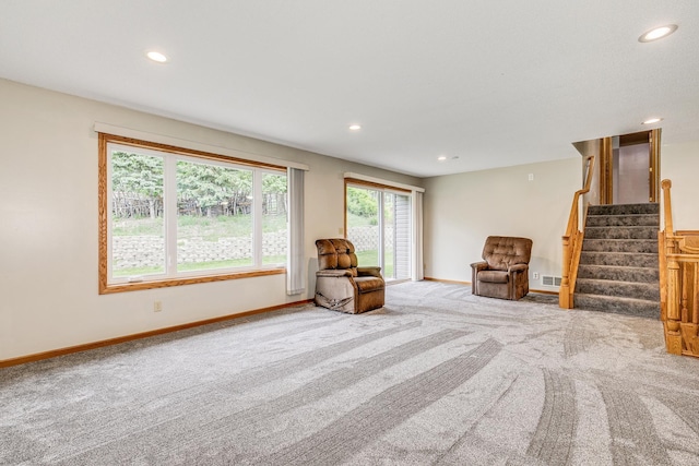 121 Yorkton Rdg, Little Canada, MN 55117 - living area featuring carpet floors, stairway, recessed lighting, and baseboards