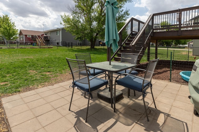 802 10th St NE, Kasson, MN 55944 - view of patio / terrace featuring stairs, outdoor dining area, and a deck
