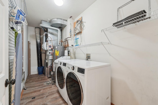 6509 154th St W, Apple Valley, MN 55124 - laundry area with independent washer and dryer and wood finished floors