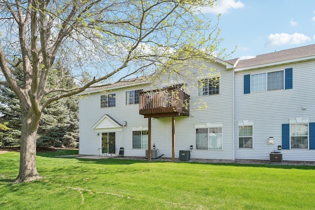 6509 154th St W, Apple Valley, MN 55124 - rear view of house featuring central AC and a yard