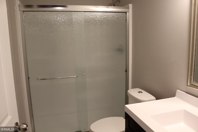 1310 Pacific St, Saint Paul, MN 55106 - full bath with a shower stall, toilet, and vanity