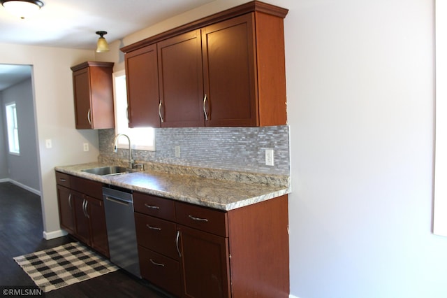 1310 Pacific St, Saint Paul, MN 55106 - kitchen with a sink, dishwasher, tasteful backsplash, baseboards, and healthy amount of natural light