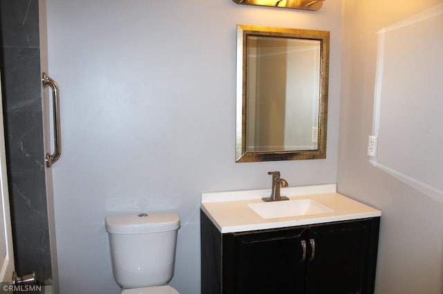 1310 Pacific St, Saint Paul, MN 55106 - bathroom featuring vanity and toilet
