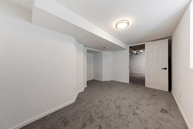 unfurnished bedroom with carpet and baseboards