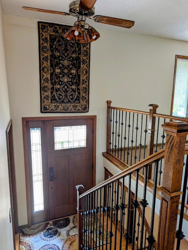 1401 5th St, Montevideo, MN 56265 - entrance foyer featuring a ceiling fan and a textured ceiling