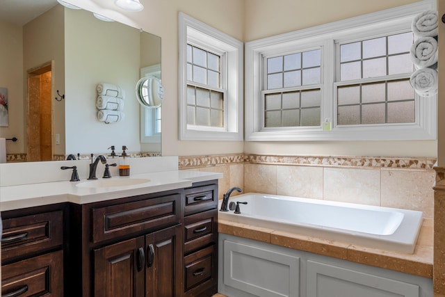 855 Elins Lake Rd SE, Cambridge, MN 55008 - bathroom with a bath and vanity