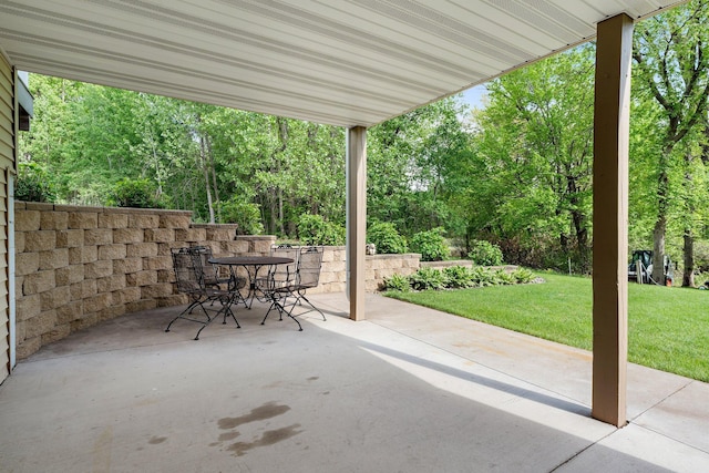 855 Elins Lake Rd SE, Cambridge, MN 55008 - view of patio / terrace with outdoor dining area and view of scattered trees