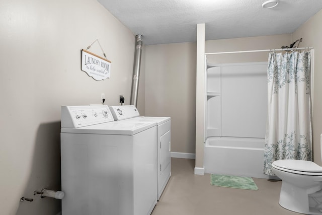 855 Elins Lake Rd SE, Cambridge, MN 55008 - washroom featuring separate washer and dryer and a textured ceiling