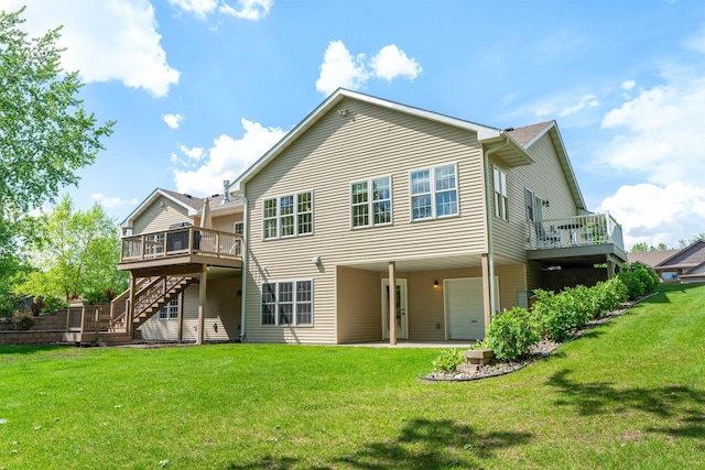 855 Elins Lake Rd SE, Cambridge, MN 55008 - back of house featuring stairs, a deck, a yard, an attached garage, and a patio