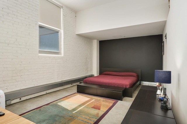 bedroom featuring brick wall