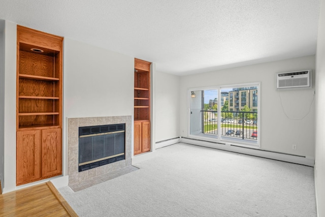 4820 Park Commons Dr Unit 329, Saint Louis Park, MN 55416 - unfurnished living room with baseboard heating, a textured ceiling, a fireplace, heating unit, and a wall unit AC