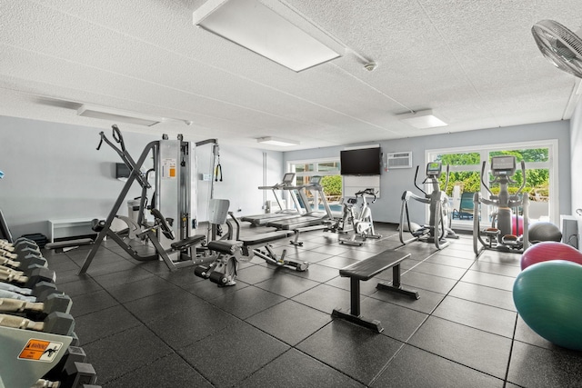 4820 Park Commons Dr Unit 329, Saint Louis Park, MN 55416 - gym featuring a textured ceiling and a wall unit AC