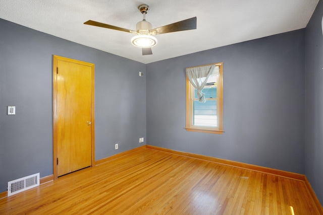 4528 6th St NE, Columbia Heights, MN 55421 - empty room with baseboards, light wood-type flooring, and ceiling fan