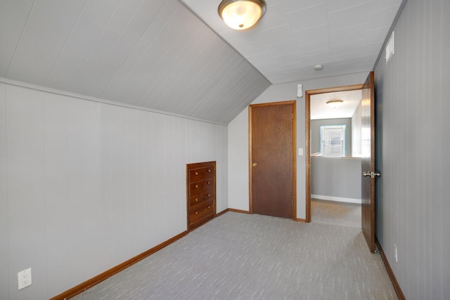 4528 6th St NE, Columbia Heights, MN 55421 - bonus room featuring carpet, vaulted ceiling, and baseboards
