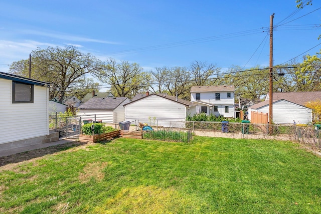4528 6th St NE, Columbia Heights, MN 55421 - view of yard with a vegetable garden and a residential view