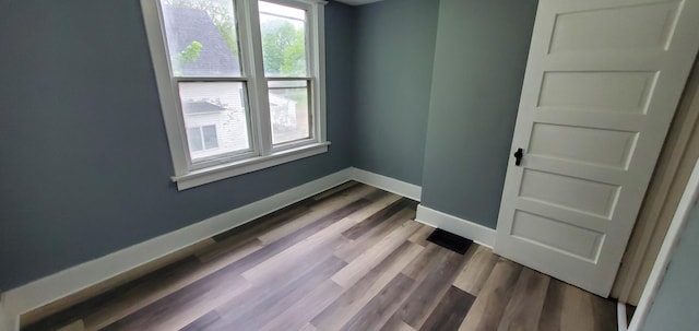 217 Flynn St, Redwood Falls, MN 56283 - spare room with baseboards and wood finished floors
