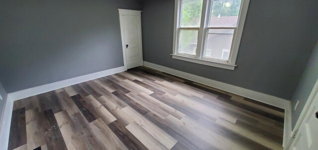 217 Flynn St, Redwood Falls, MN 56283 - spare room with baseboards and wood finished floors