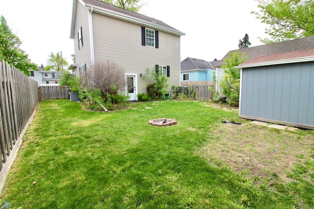 back of property with an outdoor structure