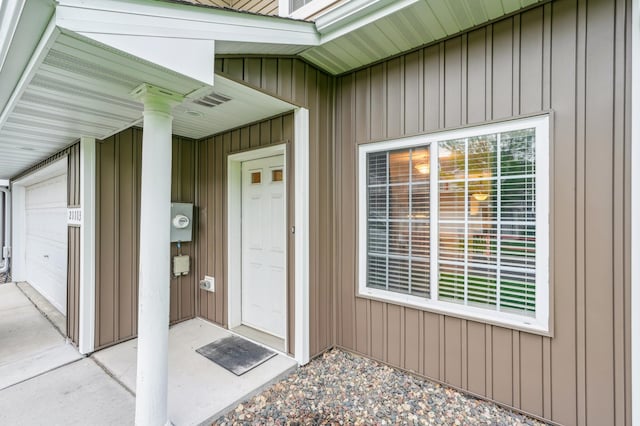 21113 Clydesdale Curv, Forest Lake, MN 55025 - entrance to property featuring board and batten siding and a garage