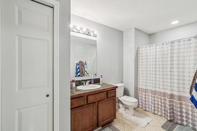21113 Clydesdale Curv, Forest Lake, MN 55025 - full bathroom with toilet, vanity, a textured ceiling, tile patterned floors, and a shower with curtain