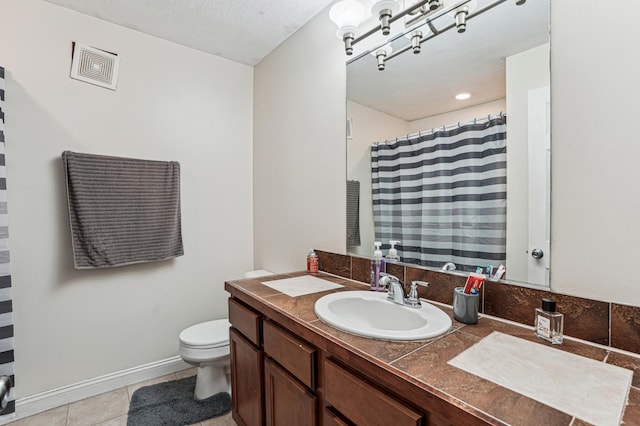 21113 Clydesdale Curv, Forest Lake, MN 55025 - full bath with toilet, vanity, tile patterned floors, baseboards, and a shower with shower curtain