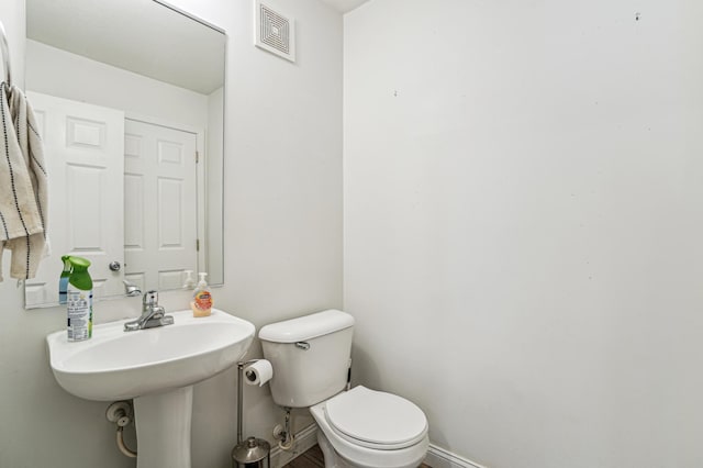 21113 Clydesdale Curv, Forest Lake, MN 55025 - half bathroom with toilet and baseboards