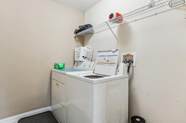 21113 Clydesdale Curv, Forest Lake, MN 55025 - laundry area featuring washer and clothes dryer and baseboards