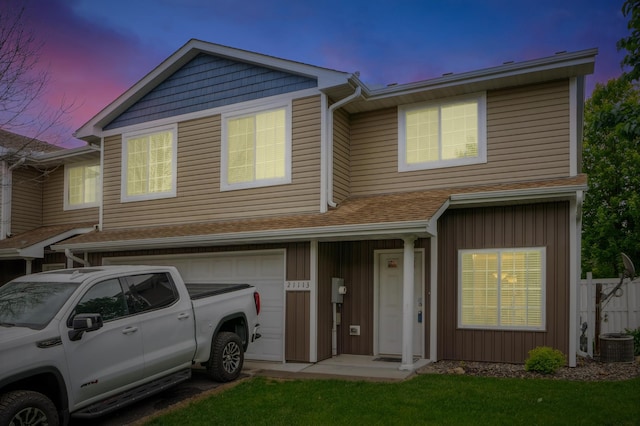 21113 Clydesdale Curv, Forest Lake, MN 55025 - view of property with a garage, cooling unit, and board and batten siding