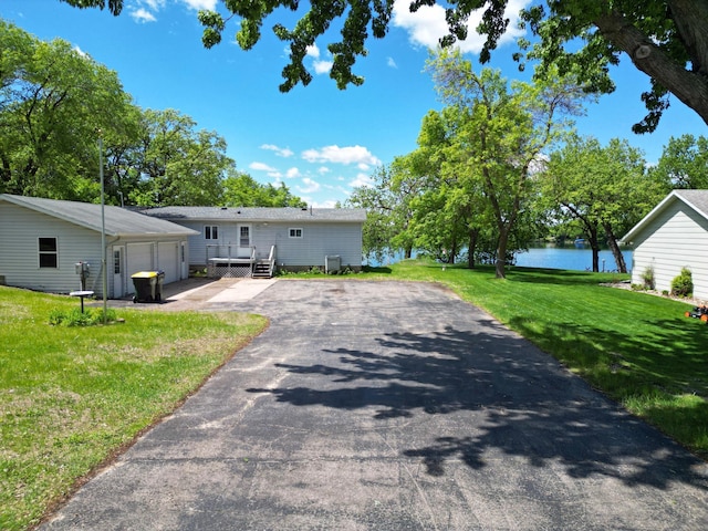 11132 County Road 9 NE, Green Lake Twp, MN 56288 - view of front of property featuring a water view and a front yard