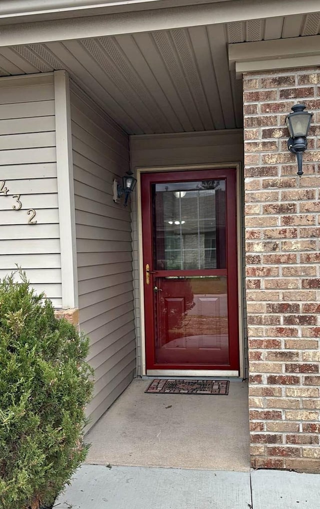 1432 Tall Grass, Hudson, WI 54016 - property entrance with brick siding