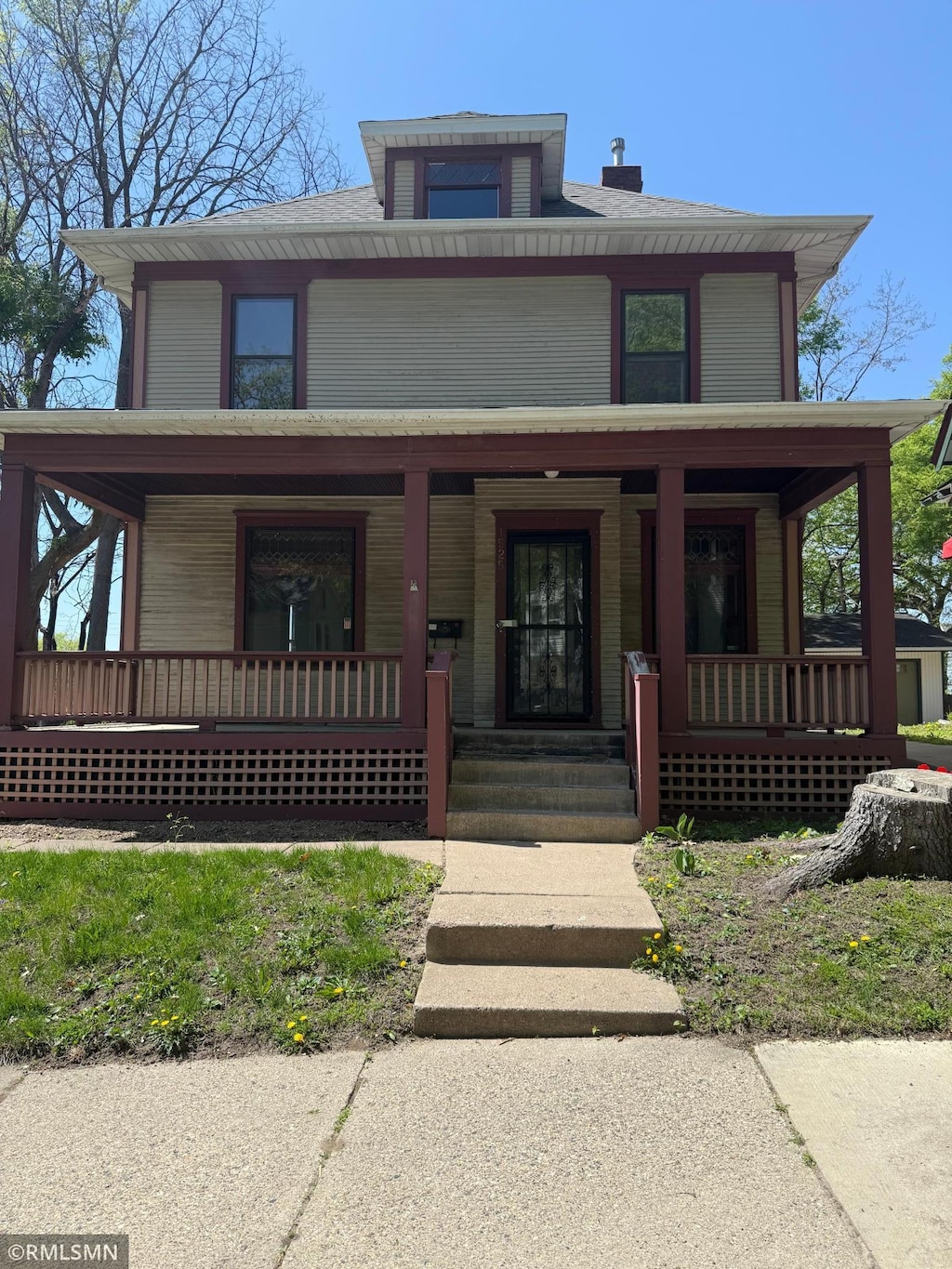traditional style home featuring a porch