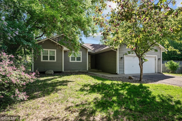 230 8th St NW, Elk River, MN 55330 - view of front of property featuring driveway and an attached garage