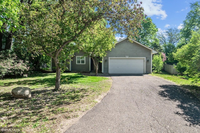 230 8th St NW, Elk River, MN 55330 - view of front of property with asphalt driveway and a garage