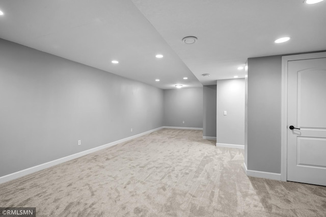 230 8th St NW, Elk River, MN 55330 - finished below grade area with recessed lighting, light carpet, and baseboards