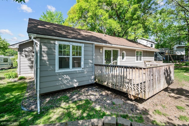 230 8th St NW, Elk River, MN 55330 - back of house featuring a deck