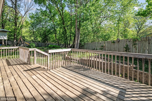 230 8th St NW, Elk River, MN 55330 - wooden terrace featuring a fenced backyard