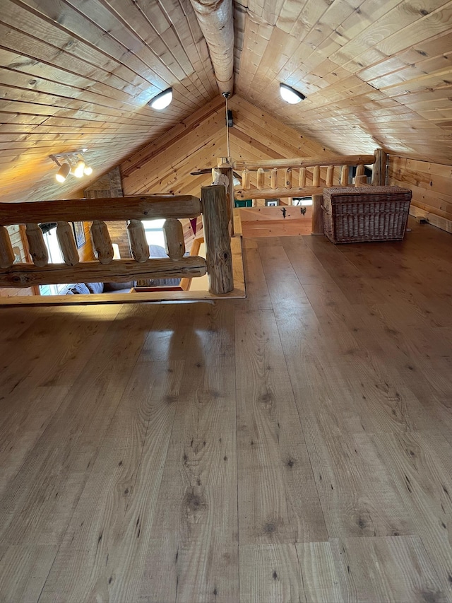 bonus room with vaulted ceiling, hardwood / wood-style floors, and wooden ceiling