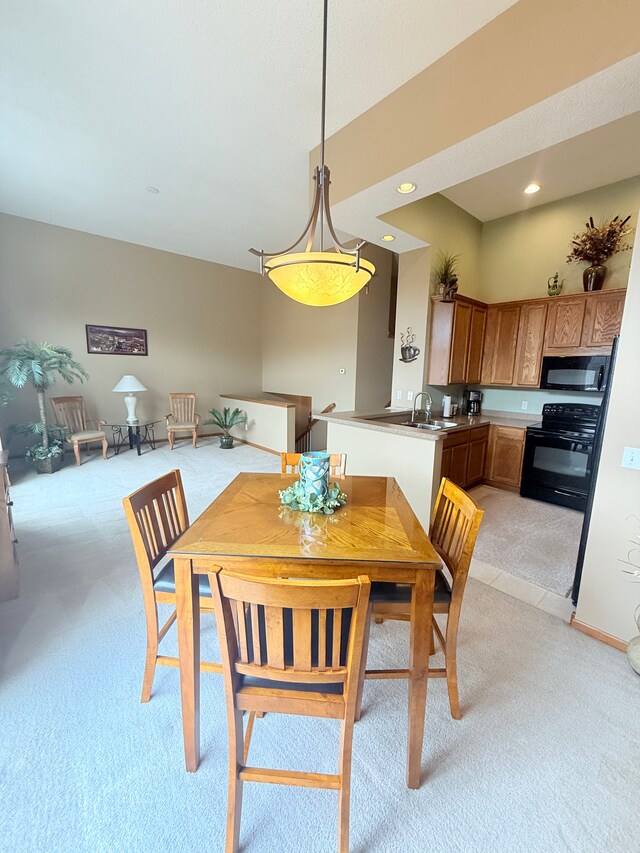 5173 Farnham Dr N, Hugo, MN 55038 - dining area featuring light carpet and recessed lighting
