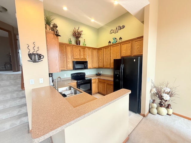 5173 Farnham Dr N, Hugo, MN 55038 - kitchen featuring black appliances, a sink, light colored carpet, light countertops, and a peninsula