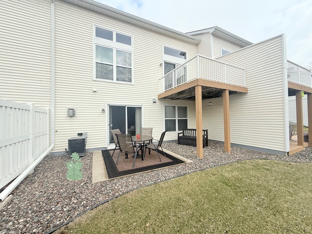 5173 Farnham Dr N, Hugo, MN 55038 - back of property with central AC unit and a patio area