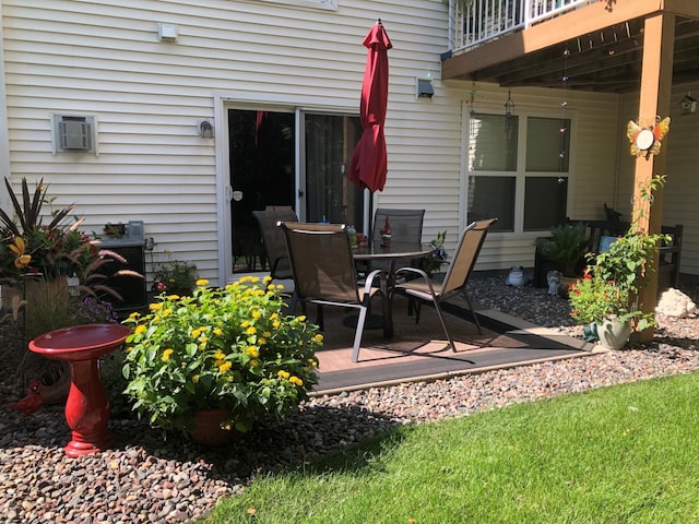 5173 Farnham Dr N, Hugo, MN 55038 - view of patio / terrace featuring a wooden deck and outdoor dining space
