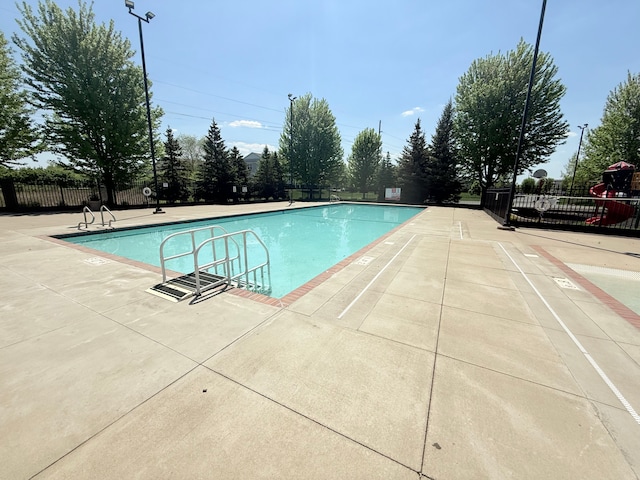 5173 Farnham Dr N, Hugo, MN 55038 - community pool with fence and a patio area
