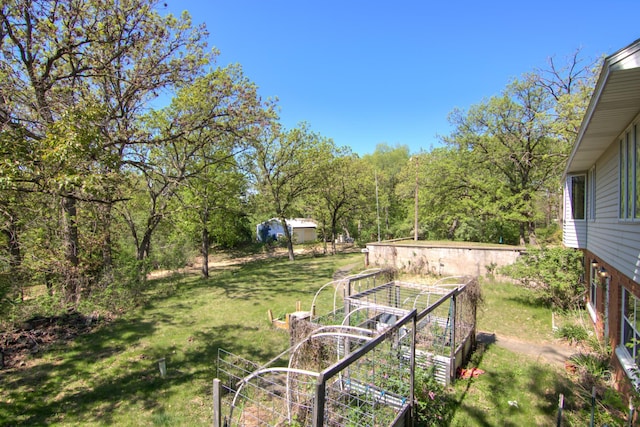 1286 Krattley Ln, North Hudson, WI 54016 - view of grassy yard with a vegetable garden