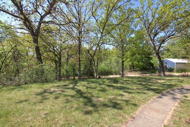 1286 Krattley Ln, North Hudson, WI 54016 - view of grassy yard featuring a view of trees