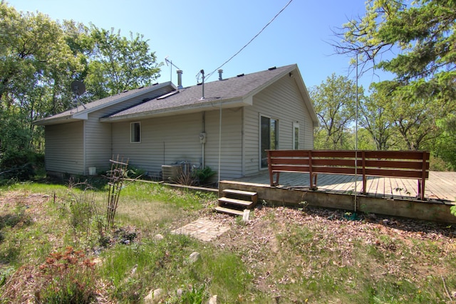 1286 Krattley Ln, North Hudson, WI 54016 - view of side of property featuring a wooden deck and central AC unit