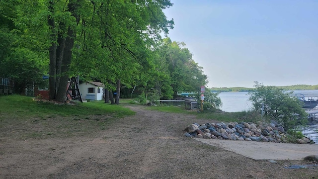 16056 Eagle Lake Ln, Brainerd, MN 56401 - view of dirt / gravel driveway with a water view